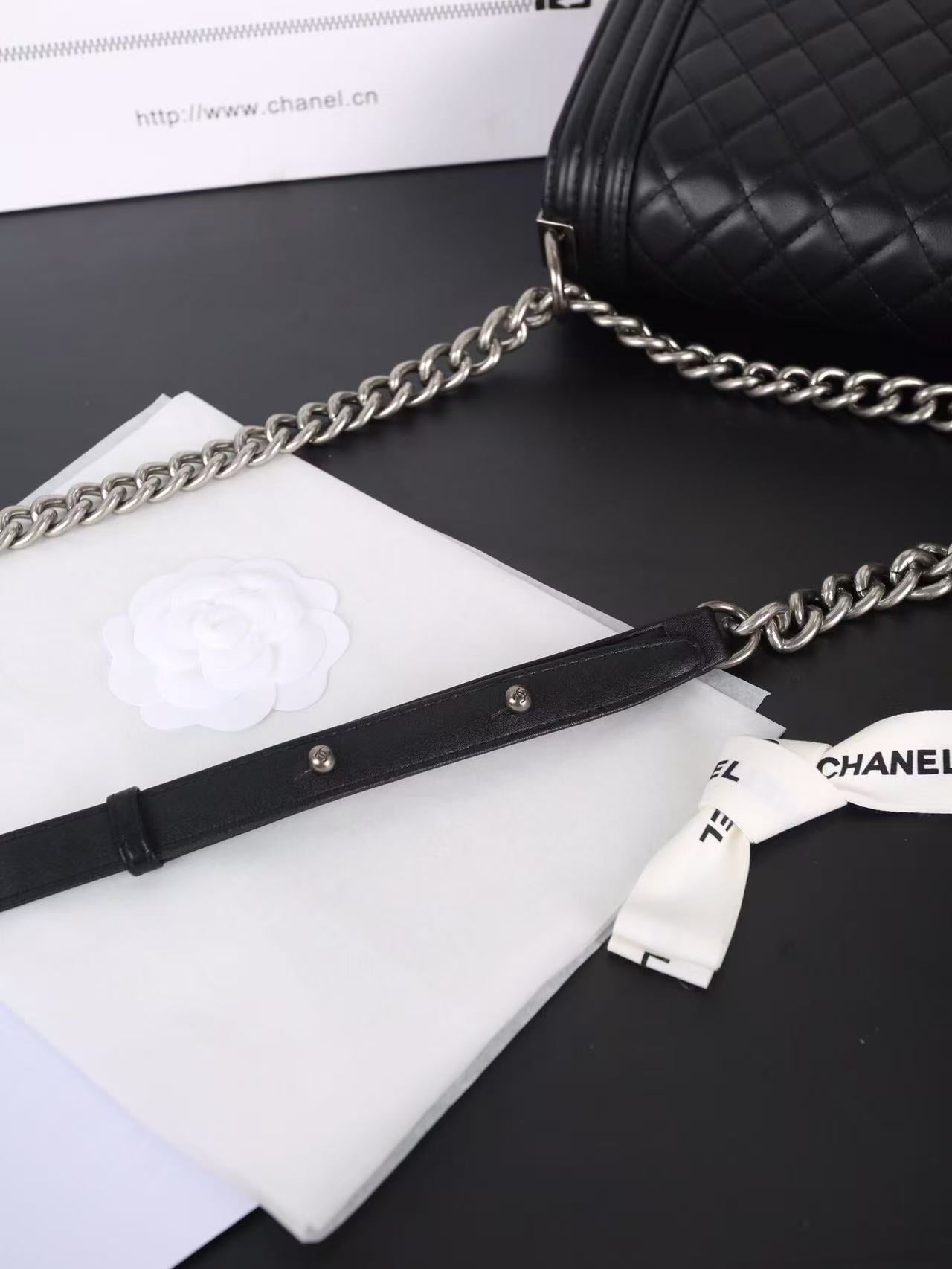 Silver buckle shoulder bag