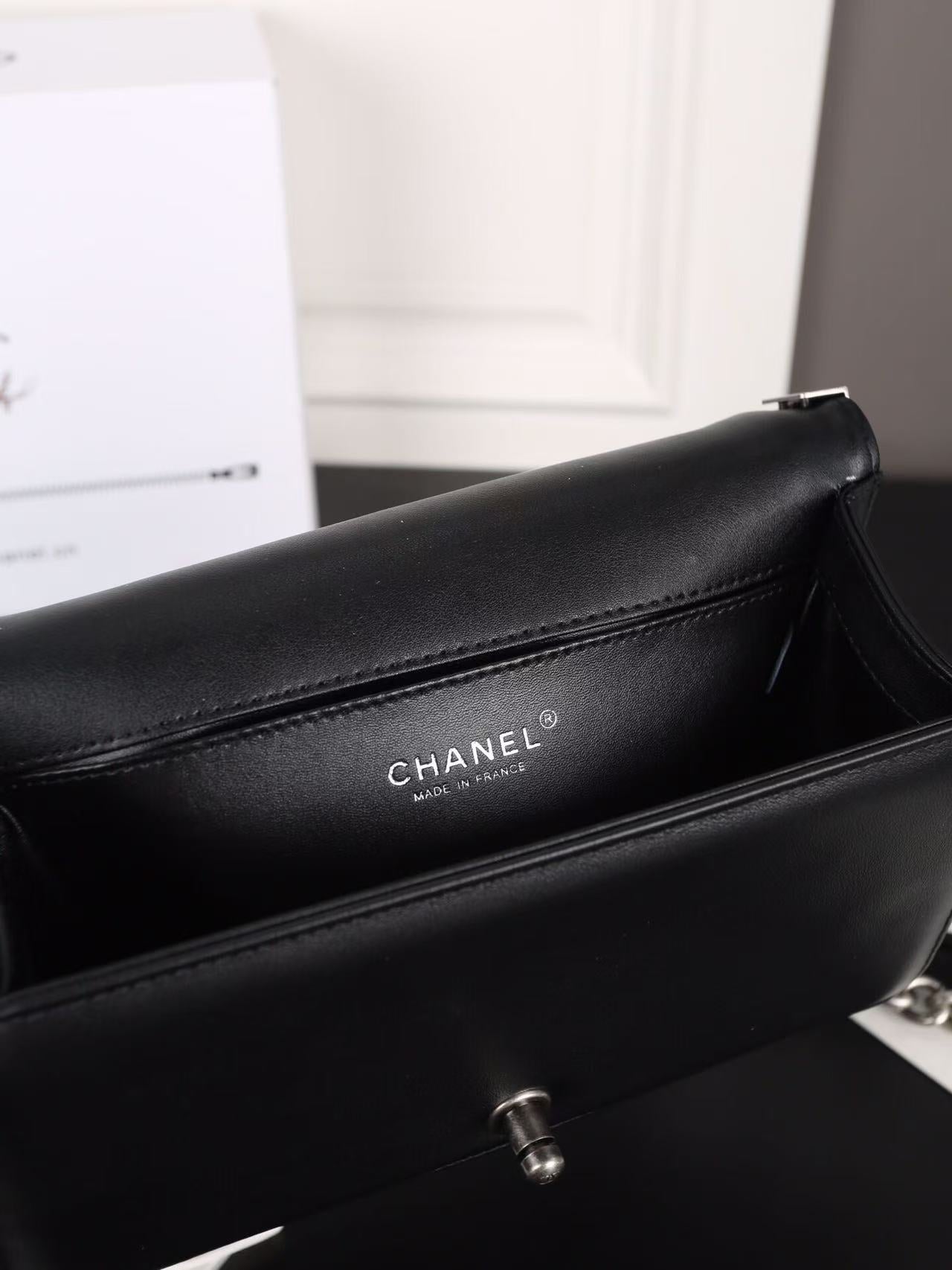Silver buckle shoulder bag