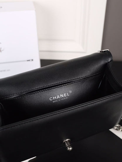 Silver buckle shoulder bag